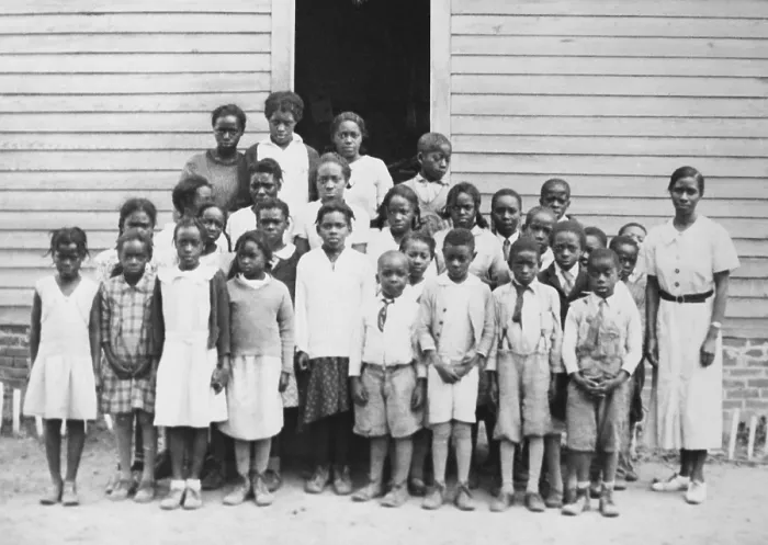 Framed Print : Twenty-six African American students in a group portrait with their teacher, at a Hurlock, Maryland, school, ca. 1930s (BSLOC_2020_2_94) Framed Print : Twenty-six African American students in a group portrait with their teacher, at a Hurlock, Maryland, school, ca. 1930s (BSLOC_2020_2_94)