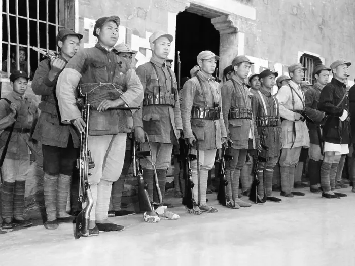 Framed Print : Typical soldiers of the Communist New Fourth Army. Most have up to date equipment, except to poorly shod soldier in the front row