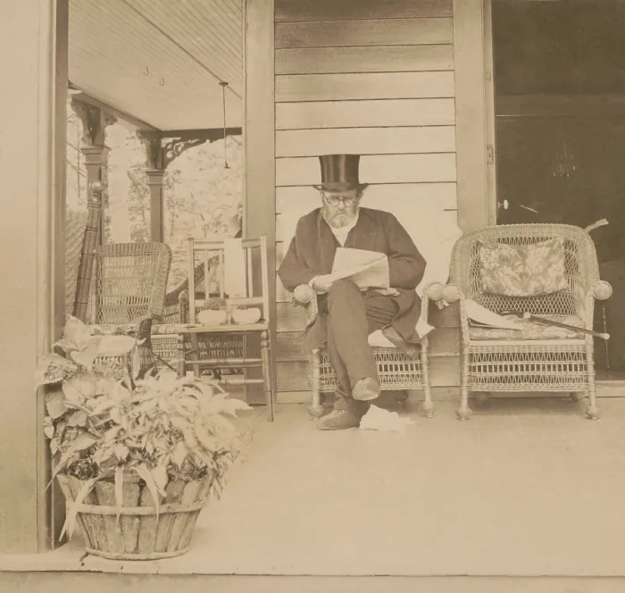 Framed Print : Ulysses S. Grant reading a newspaper at his home in Mount McGregor, New York