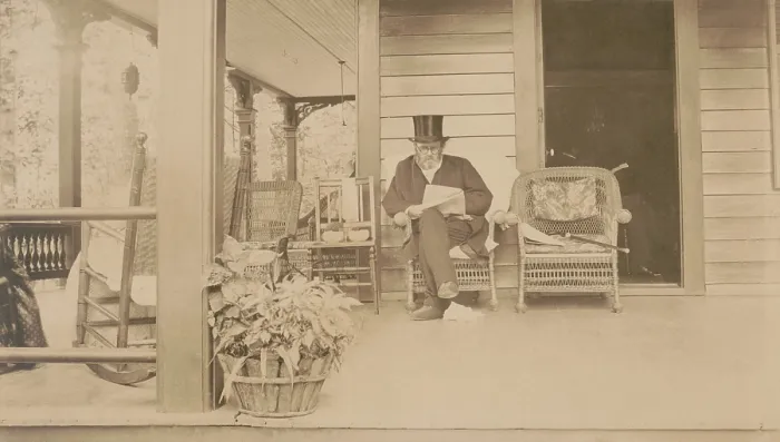 Framed Print : Ulysses S. Grant reading a newspaper at his home in Mount McGregor, New York