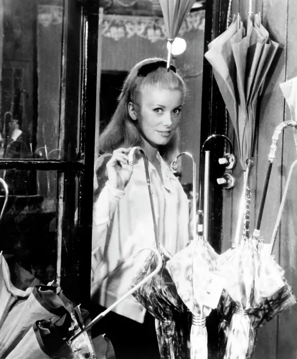 Framed Print : THE UMBRELLAS OF CHERBOURG, (aka LES PARAPLUIES DE CHERBOURG), Catherine Deneuve, 1964
