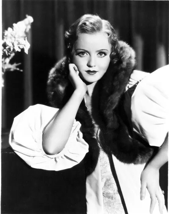 Framed Print : UNDER-COVER MAN, (aka UNDERCOVER MAN), Nancy Carroll, in a white velvet wrap trimmed with sable, 1932