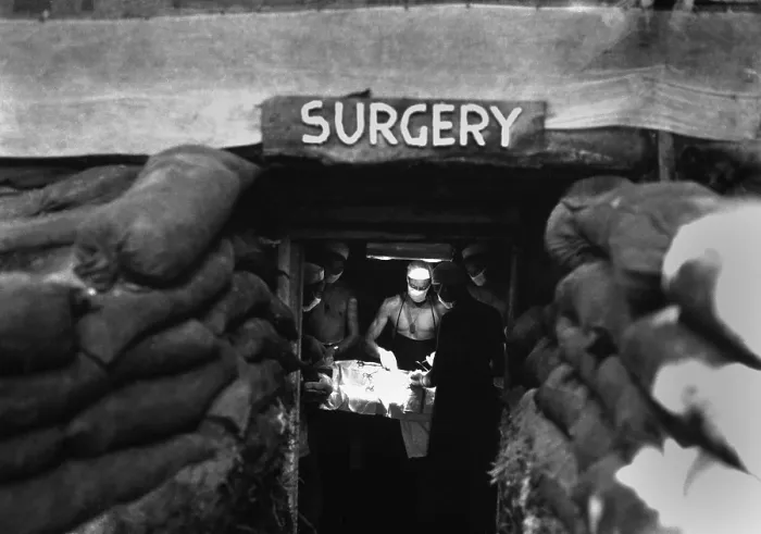 Framed Print : Underground surgery room, behind the front lines on Bougainville, Solomon Islands. An American Army doctor operates on a soldier wounded by a Japanese sniper. Dec. 13, 1943 Framed Print : Underground surgery room, behind the front lines on Bougainville, Solomon Islands. An American Army doctor operates on a soldier wounded by a Japanese sniper. Dec. 13, 1943