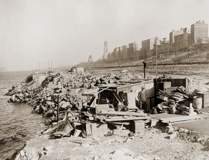 Framed Print : An unemployed a man standing near his hut in a New York City shanty town during the Great Depression Framed Print : An unemployed a man standing near his hut in a New York City shanty town during the Great Depression