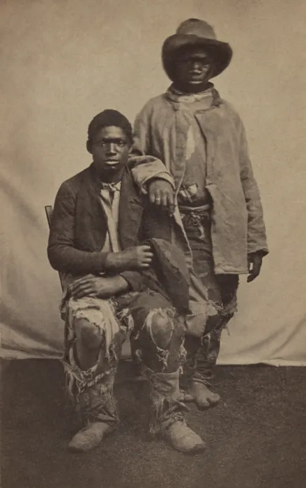 Framed Print : Two unidentified escaped male slaves wearing ragged clothes in Louisiana during the Civil War, C. 1861-65. Photo by McPherson & Oliver, Baton Rouge (BSLOC_2018_5_90)