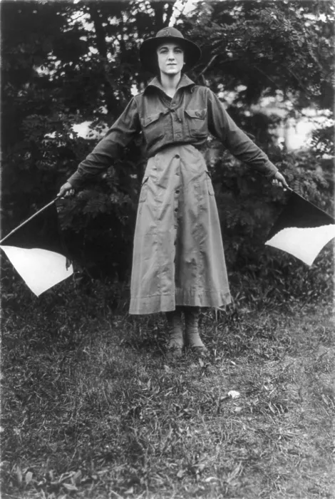 Framed Print : Uniformed woman using signal flags, wig wag girl of the Woman's Defense League in the camp near Washington DC, 1916 Framed Print : Uniformed woman using signal flags, wig wag girl of the Woman's Defense League in the camp near Washington DC, 1916