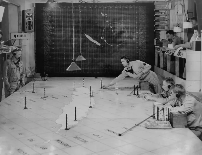 Framed Print : U.S. Army Signal Corps using radar plotting board. They track aircraft at 1st Island Command Headquarters, Noumea, New Caledonia. 1943. World War 2. (BSLOC_2013_14_68)