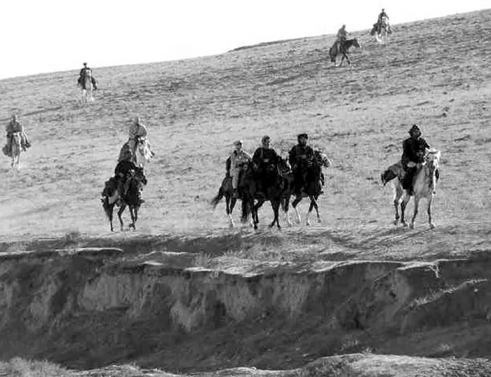 Framed Print : U.S. Army Special Forces ride horse-back alongside Afghan Northern Alliance horse cavalry