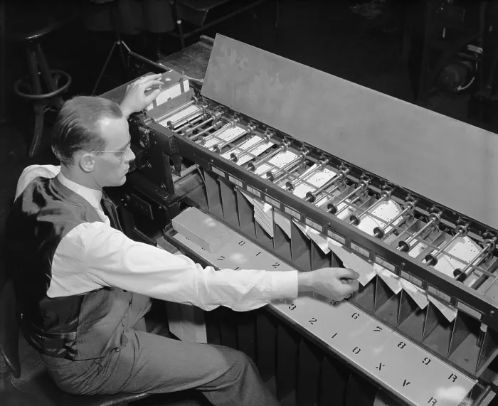 Framed Print : U.S. Bureau of the Census computer operator at a punch card sorter, ca. 1940. (BSLOC_2013_8_187)