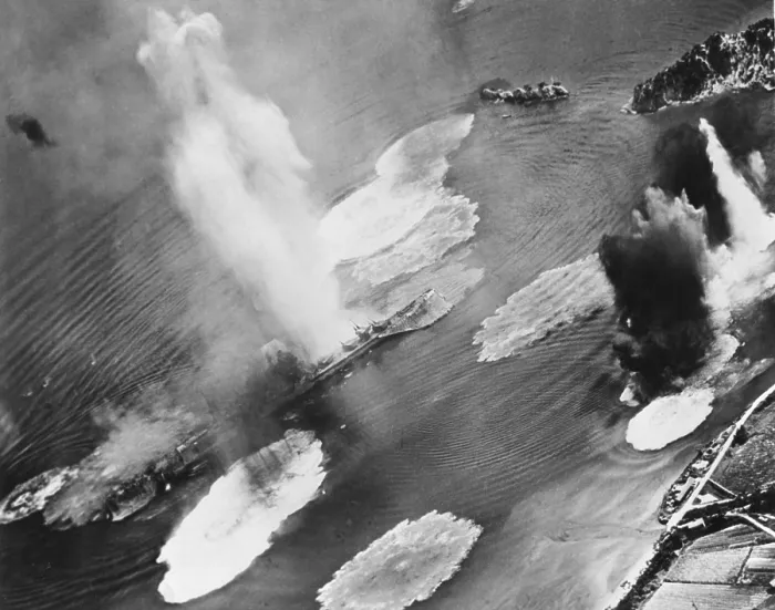 Framed Print : U.S. carrier planes bomb Japanese cruisers anchored in the Kure Harbor Naval Base at Honshu