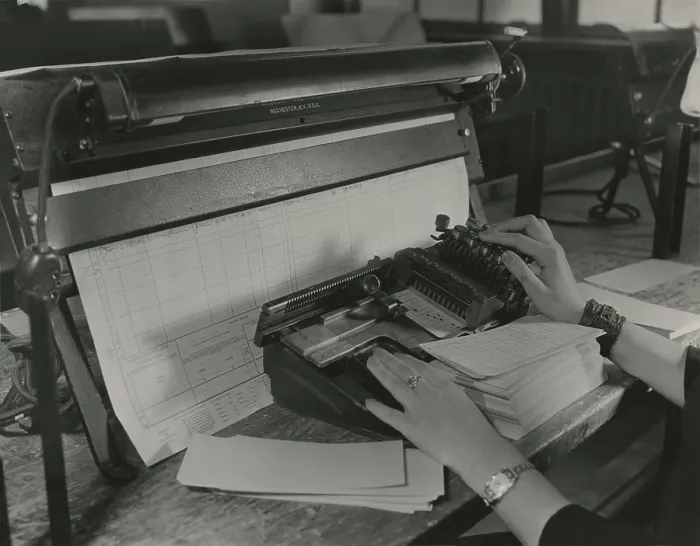 Framed Print : U.S. Census worker transferring information from a questionnaire to a punch card, ca. 1940. (BSLOC_2013_8_277) Framed Print : U.S. Census worker transferring information from a questionnaire to a punch card, ca. 1940. (BSLOC_2013_8_277)
