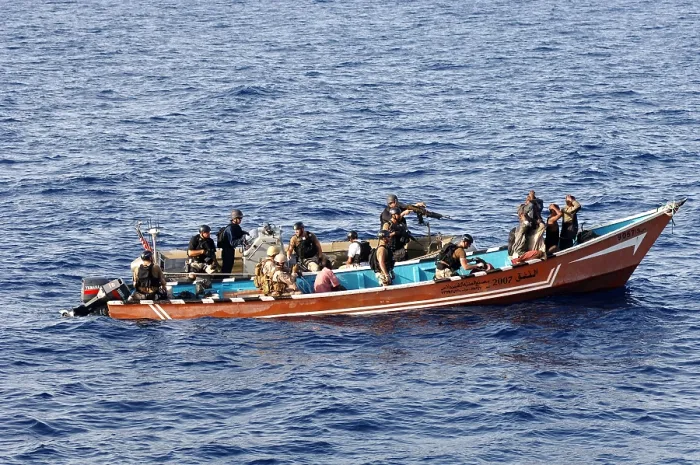 Framed Print : U.S. Coast Guardsmen board and search a skiff in Gulf of Aden suspected of participating in recent pirate activity May 31 2010, Photo by:Everett Collection(BSLOC_2011_6_200)
