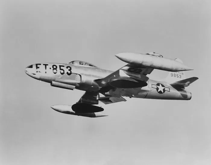 Framed Print : U.S. F-80 jet fighter carrying napalm in seventy five gallons dark colored wing tanks. Korean War, 1950-53. (BSLOC_2014_11_226)