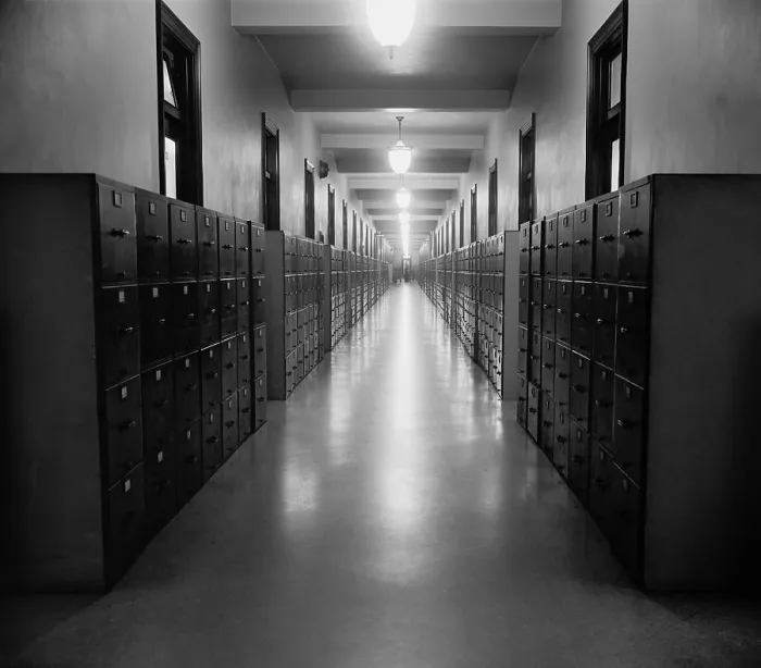 Framed Print : U.S. Government hallway lined with file cabinets, ca. 1937. (BSLOC_2013_8_179)