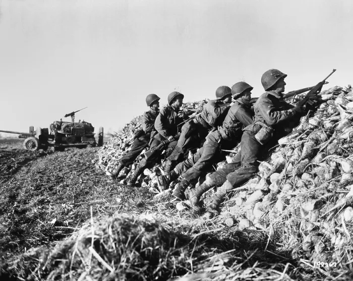 Framed Print : U.S. Infantry anti-tank crew fires on Germans who machine-gunned their vehicle. In the Netherlands, Nov. 4, 1944 during World War 2. (BSLOC_2014_2_172)