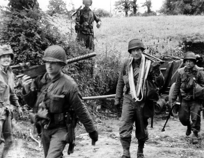 Framed Print : U.S. infantry machine gun platoon moving inland from Utah Beach on June 6, 1944. Normandy Invasion, World War 2. (BSLOC_2014_2_76) Framed Print : U.S. infantry machine gun platoon moving inland from Utah Beach on June 6, 1944. Normandy Invasion, World War 2. (BSLOC_2014_2_76)