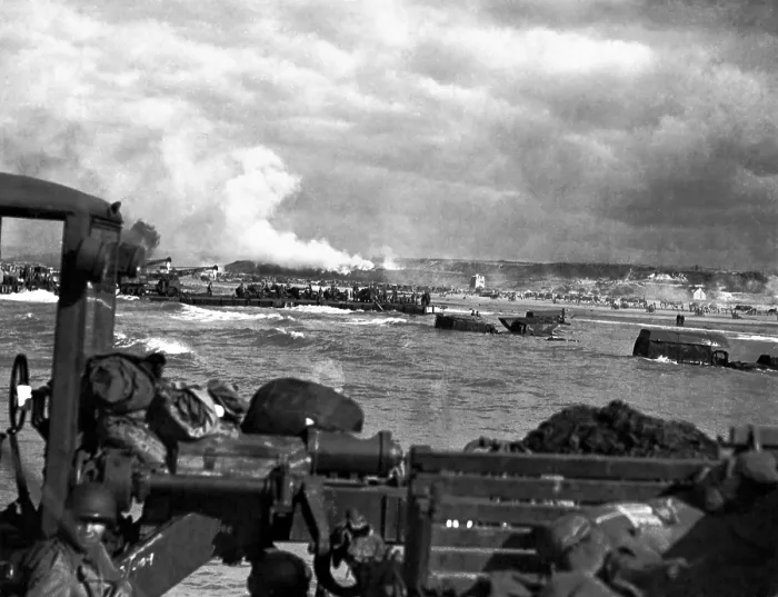 Framed Print : U.S. landing craft approaching Omaha Beach in Normandy beach on Dec. 6, 1944. Soldiers are standing on ships decks, indicating heavy German resistance had ceased Framed Print : U.S. landing craft approaching Omaha Beach in Normandy beach on Dec. 6, 1944. Soldiers are standing on ships decks, indicating heavy German resistance had ceased