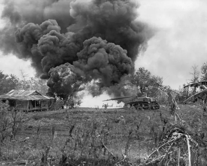 Framed Print : U.S. Marine flame-throwing tank attacks a Japanese pillbox on Saipan. In mid-ground a Marine watches from a foxhole. Battle of Saipan was fought from June 15-July 9, 1944 Framed Print : U.S. Marine flame-throwing tank attacks a Japanese pillbox on Saipan. In mid-ground a Marine watches from a foxhole. Battle of Saipan was fought from June 15-July 9, 1944