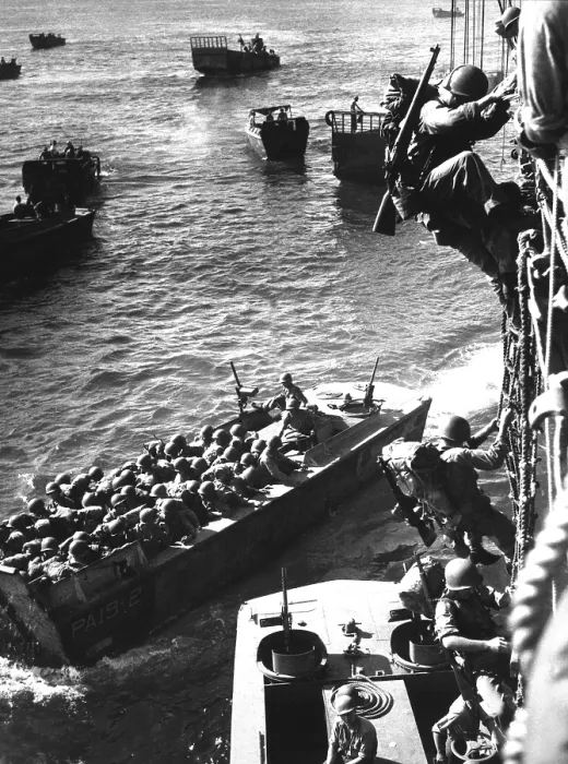 Framed Print : U.S. Marine invasion of Japanese held Bougainville, in the Solomon Islands, Nov. 1, 1943. Soldiers climb down rope nets to Coast Guard landing barges