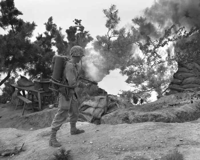 Framed Print : U.S. Marine uses flame thrower to burn out enemy position on Wolmi Island, gateway to Inchon. Sept. 15, 1950. Korean War, 1950-53. (BSLOC_2014_11_35)