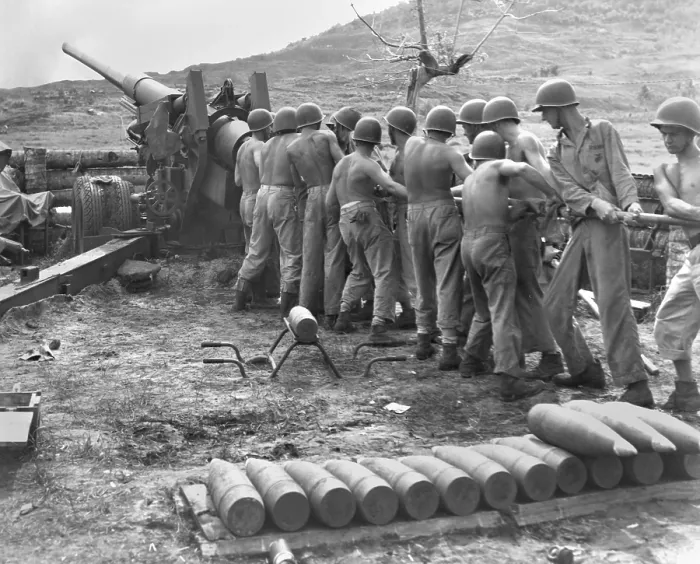 Framed Print : U.S. Marines cleaning artillery on Guam Island. Gunners swab the bore of their gun during a lull in fighting against the Japanese. July-Aug. 1944, World War 2. (BSLOC_2013_14_44) Framed Print : U.S. Marines cleaning artillery on Guam Island. Gunners swab the bore of their gun during a lull in fighting against the Japanese. July-Aug. 1944, World War 2. (BSLOC_2013_14_44)