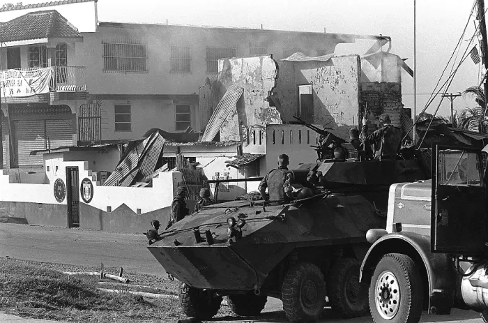 Framed Print : U.S. Marines in their light armored vehicles guard a destroyed Panamanian Defense Force building in Panama City Dec. 20 1989. (BSLOC_2011_3_20) Framed Print : U.S. Marines in their light armored vehicles guard a destroyed Panamanian Defense Force building in Panama City Dec. 20 1989. (BSLOC_2011_3_20)