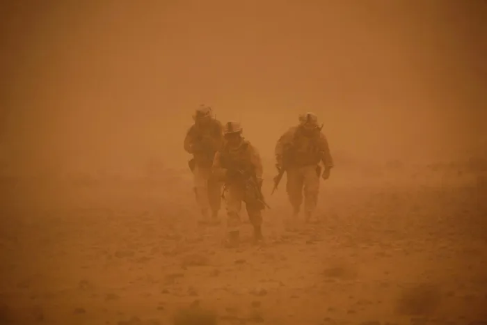 Framed Print : U.S. Marines in a sand storm returning to their vehicles after patrolling a nearby mountain ridge in Bakwa Afghanistan May 3 2010. Photo by:Everett Collection(BSLOC_2011_6_56) Framed Print : U.S. Marines in a sand storm returning to their vehicles after patrolling a nearby mountain ridge in Bakwa Afghanistan May 3 2010. Photo by:Everett Collection(BSLOC_2011_6_56)