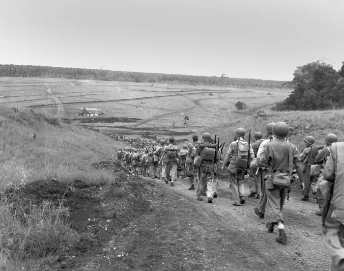 Framed Print : U.S. Marines tired and weary from continuous fighting, march to the U.S. held valley on Guadalcanal. Jan. 1943, during World War 2. (BSLOC_2013_14_31) Framed Print : U.S. Marines tired and weary from continuous fighting, march to the U.S. held valley on Guadalcanal. Jan. 1943, during World War 2. (BSLOC_2013_14_31)