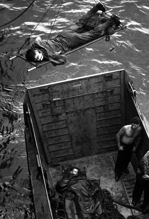 Framed Print : U.S. Marines wounded in the initial invasion at Empress Augusta Bay, Bougainville, against the Japanese. Nov. 1943. The casualty is hoisted aboard a Coast Guard-manned transport Framed Print : U.S. Marines wounded in the initial invasion at Empress Augusta Bay, Bougainville, against the Japanese. Nov. 1943. The casualty is hoisted aboard a Coast Guard-manned transport