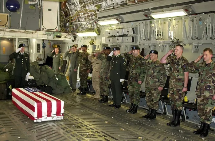 Framed Print : U.S. Military personnel salute the flag draped coffin Chief Petty Officer Matthew J. Bourgeois during his Fallen Soldier Ceremony at Ramstein Air Base Germany
