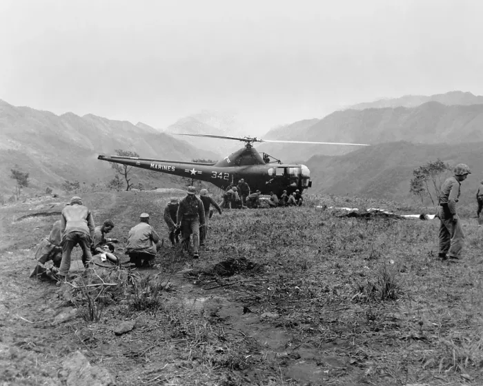 Framed Print : U.S. Navy Corpsmen prepare three Marines for evacuation evacuated via helicopter. May 23, 1951