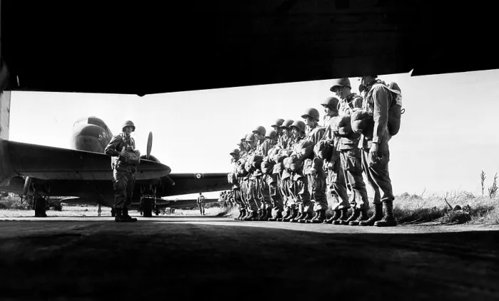 Framed Print : U.S. paratroopers lining up before taking off on training maneuvers somewhere in England, ca. 1942
