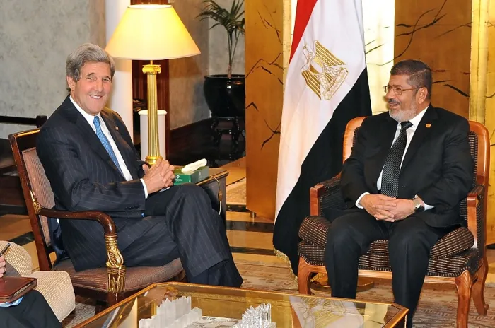 Framed Print : U.S. Secretary of State John Kerry meets with Egyptian President Mohamed Morsi. May 25, 2013. They were attending the 50th Anniversary African Union Summit in Addis Ababa