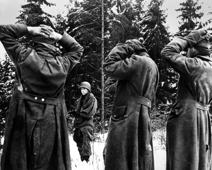 Framed Print : U.S. soldier guarding German POWs taken from Dec. 16, 1944 through Jan. 25, 1945. They were among 50, 000 Nazi prisoners taken in Dec. 1944 alone. The Battle of Bulge, World War 2