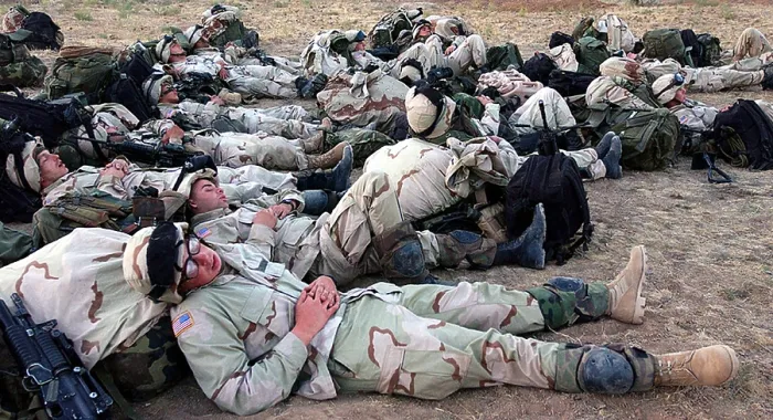 Framed Print : U.S. Soldiers of the 10th Mountain Division sleep in an open field after their first day in Uzbekistan where U.S
