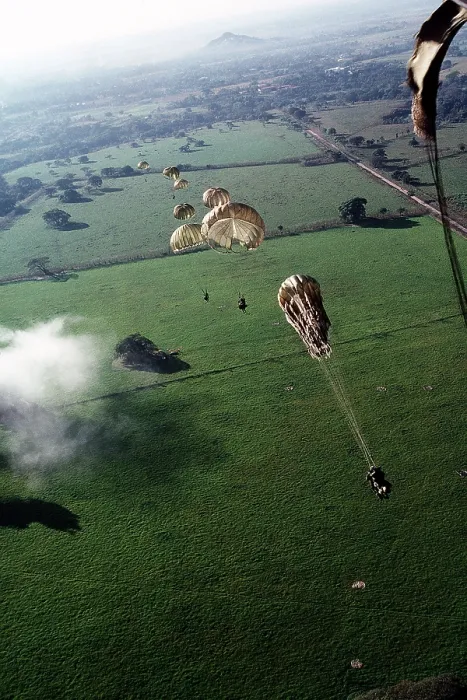Framed Print : U.S. Soldiers of 1st Battalion 509th Infantry parachute from into a drop zone outside the Panama City during the U.S. invasion of Panama. Dec. 1989. (BSLOC_2011_3_22)