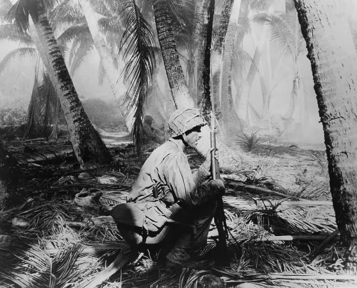 Framed Print : U.S. Soldiers crouch on palm fronds as they push ahead on Makin Atoll in the Gilbert Islands. Nov. 20-23, 1943. U.S Framed Print : U.S. Soldiers crouch on palm fronds as they push ahead on Makin Atoll in the Gilbert Islands. Nov. 20-23, 1943. U.S