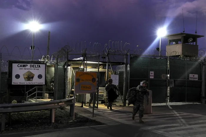 Framed Print : U.S. Soldiers exit a controlled entryway after completing their 12-hour shifts at Camp Delta Guantanamo Bay Naval Base Cuba June 9 2010