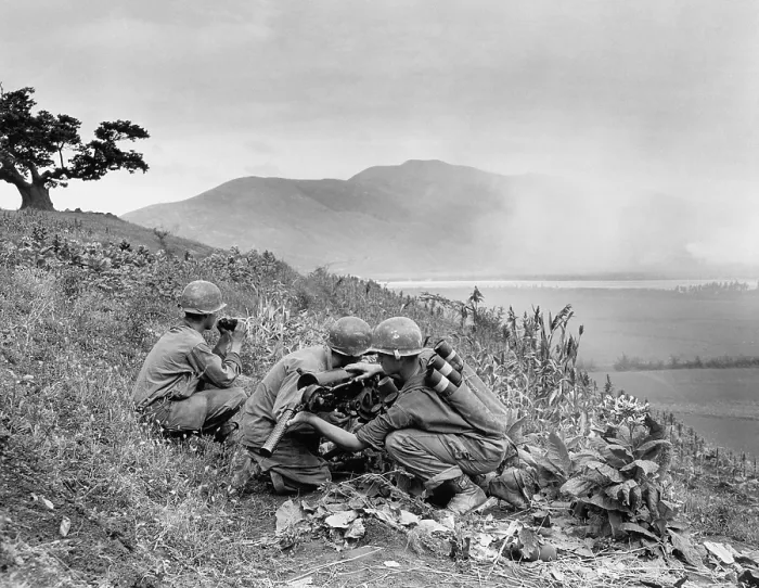 Framed Print : U.S. soldiers knocking out a machine gun nest of the Communists with their 57-mm gun. 24th Infantry Division. Ca. 1953. Korean War, 1950-53. (BSLOC_2014_11_127)