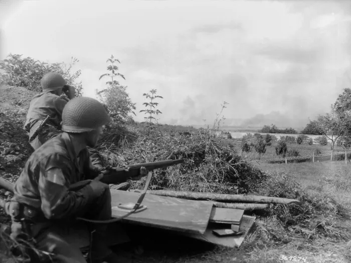 Framed Print : Two U.S. soldiers observe smoke from the Battle of the Falaise Pocket. They were on a reconnaissance patrol, behind the Castle of Bourg St. Leonard Framed Print : Two U.S. soldiers observe smoke from the Battle of the Falaise Pocket. They were on a reconnaissance patrol, behind the Castle of Bourg St. Leonard