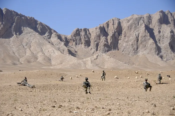Framed Print : U.S. Soldiers take a security halt during a patrol off Highway 1 in Zabul province Afghanistan Oct. 18 2010. Photo by:Everett Collection(BSLOC_2011_6_63)