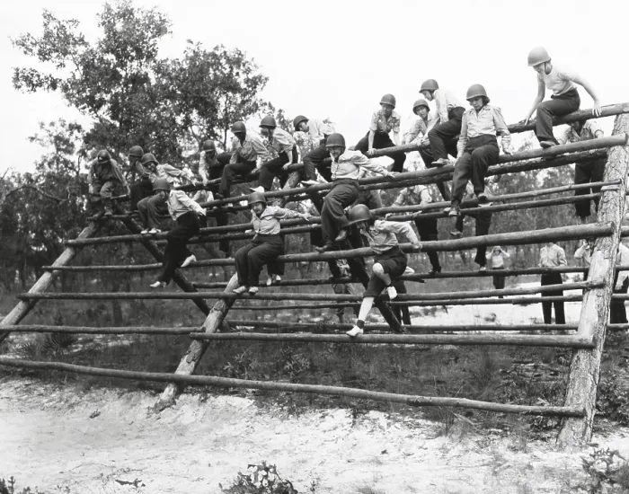 Framed Print : U.S. Women's Army Corps nurses in basic training. The WACs climb a log ladder on the obstacle course at Camp Blanding, Fla. Oct. 1, 1943. World War 2. (BSLOC_2014_10_196)