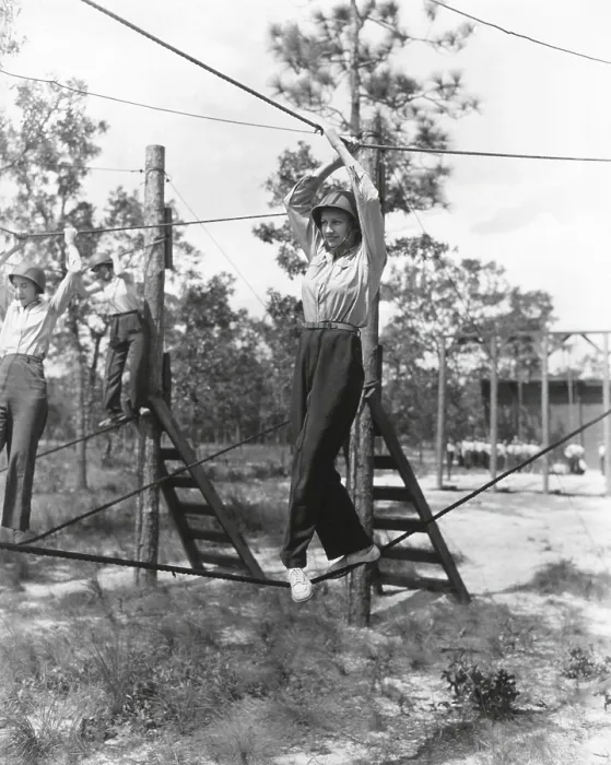 Framed Print : U.S. Women's Army Corps nurses in basic training. The WACs walk a tight rope on the obstacle course at Camp Blanding, Fla. Oct. 1, 1943. World War 2. (BSLOC_2014_10_197)