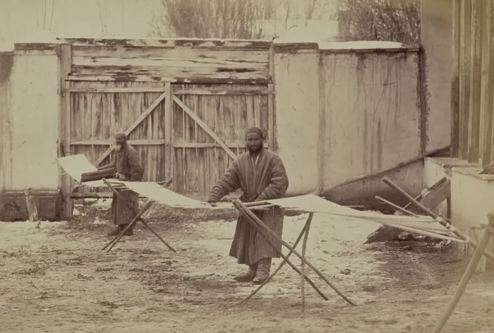 Framed Print : Using pre-industrial methods, two men prepare a warp for cotton cloth in Taskestan ca. 1870 Framed Print : Using pre-industrial methods, two men prepare a warp for cotton cloth in Taskestan ca. 1870