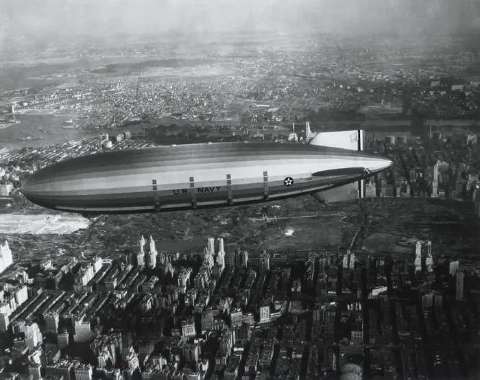 Framed Print : USS Akron in flight over New York City, ca. 1932. Akron, a helium-filled rigid airship of the U.S Framed Print : USS Akron in flight over New York City, ca. 1932. Akron, a helium-filled rigid airship of the U.S