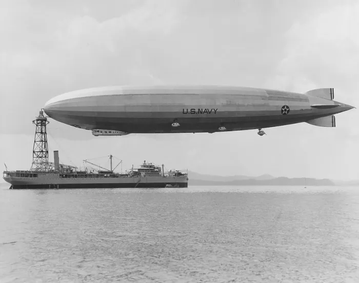 Framed Print : USS Los Angeles at the mooring mast of the USS Patoka, 125 feet above the water. The ship was in the Pacific Ocean off Panama during fleet exercises in Feb
