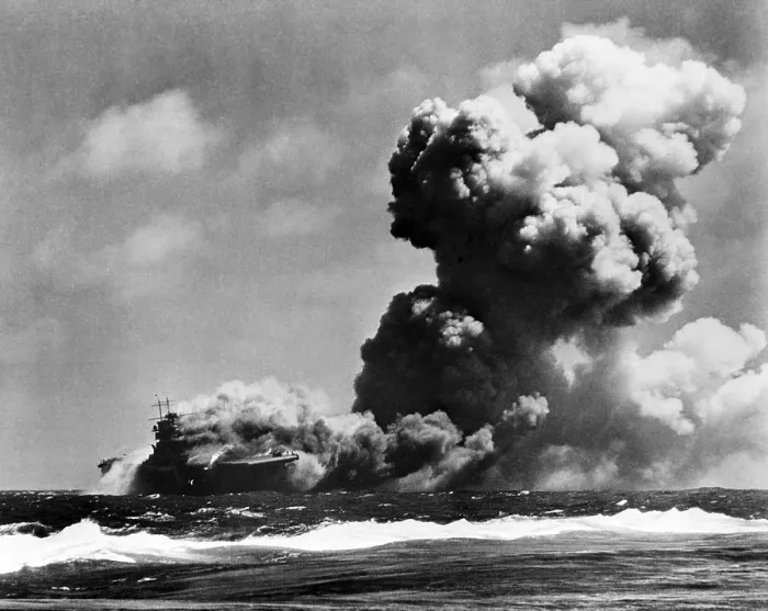 Framed Print : The USS Wasp burning after she was struck by three torpedoes from a Japanese submarine. South West Pacific, east of the Solomon Islands, where she sank on Sept. 15, 1942
