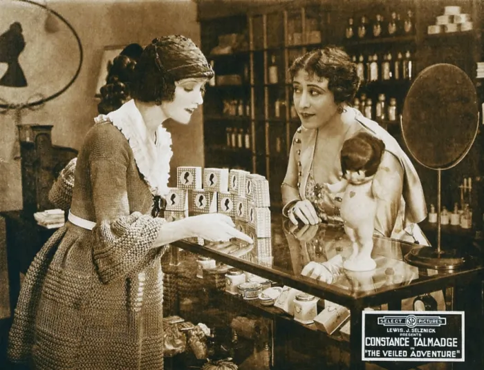 Framed Print : THE VEILED ADVENTURE, left: Constance Talmadge on lobbycard, 1919