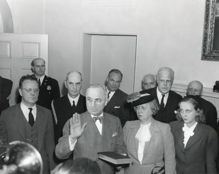 Framed Print : Vice-President Harry Truman is taking the oath of office, at 7:09 p.m. on April 12, 1945. Bess and Margaret Truman are standing to the new President's right
