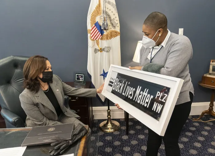 Framed Print : Vice President Kamala Harris is shown a Black Lives Matter street sign by Symone Sanders, Senior Advisor and Chief Spokes Person for the Vice President. Feb Framed Print : Vice President Kamala Harris is shown a Black Lives Matter street sign by Symone Sanders, Senior Advisor and Chief Spokes Person for the Vice President. Feb